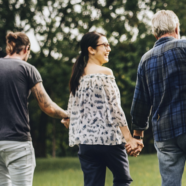 People holding hands — community CSR
